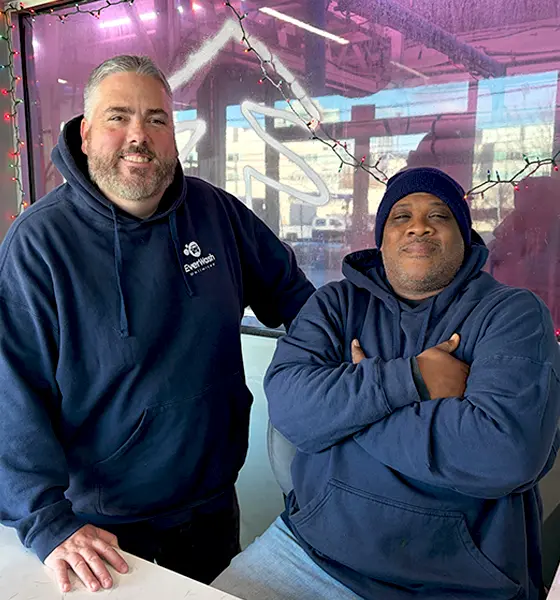 Happy car wash owner team